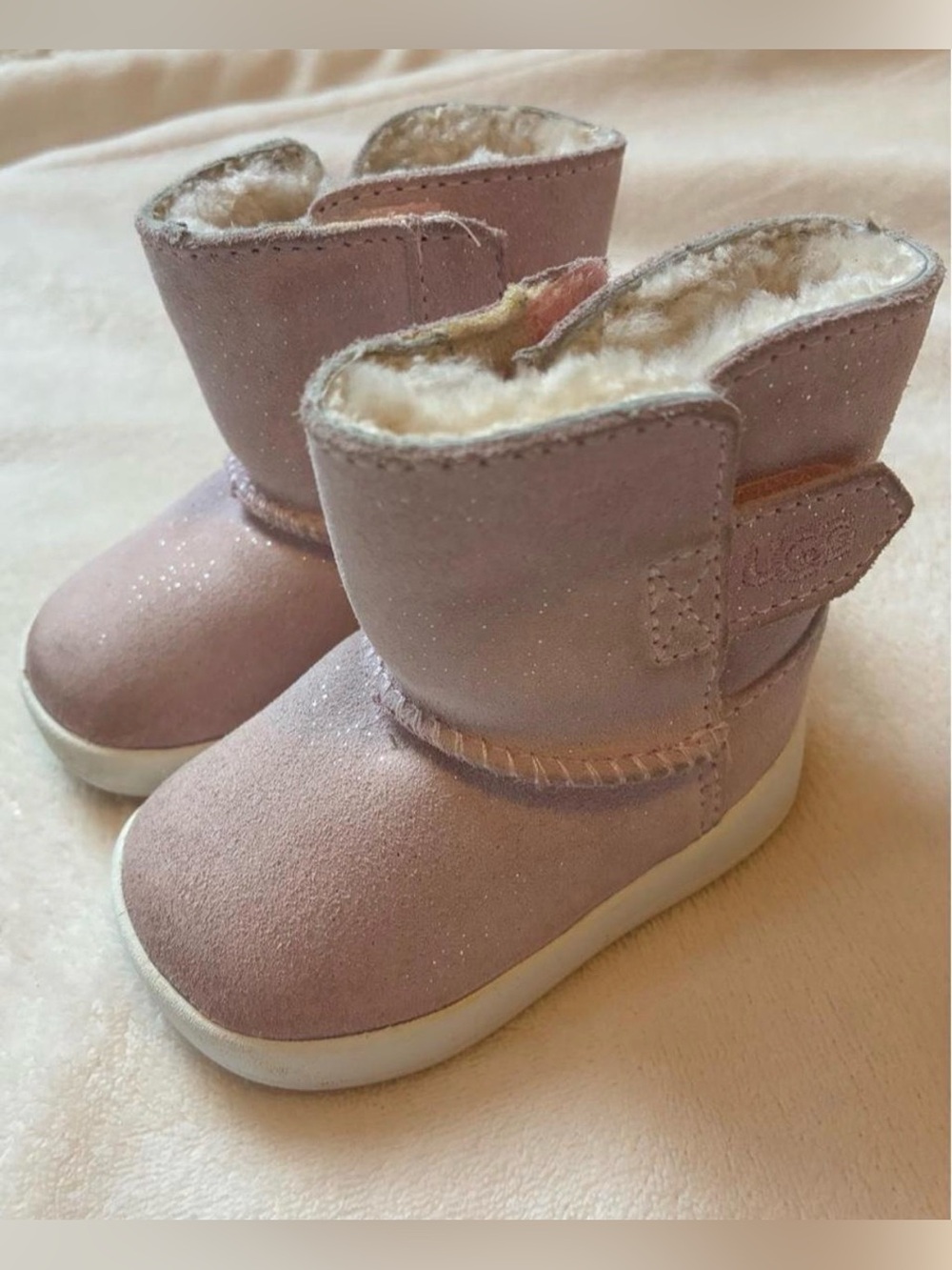 UGG light pink baby boots in size 2/3